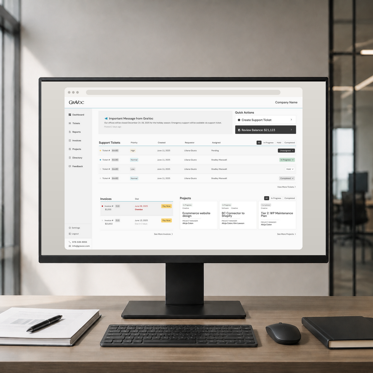 GraVoc Customer Portal dashboard on a desktop monitor